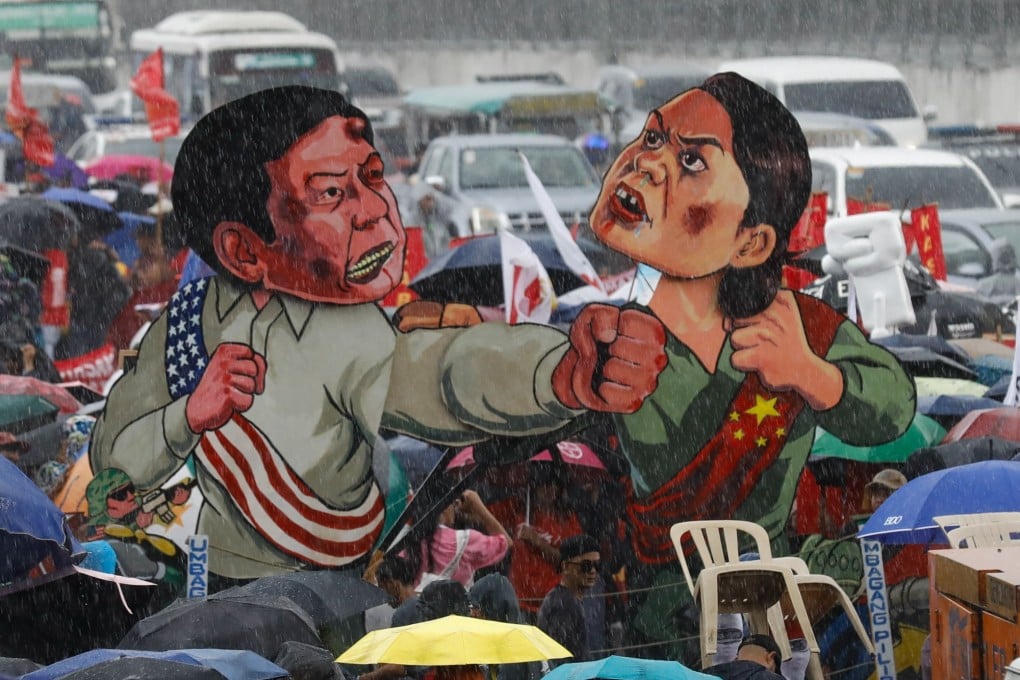 Cutouts of President Ferdinand Marcos Jnr (left) and Vice-President Sara Duterte (right) displayed during a protest in Metro Manila in July. Photo: EPA-EFE