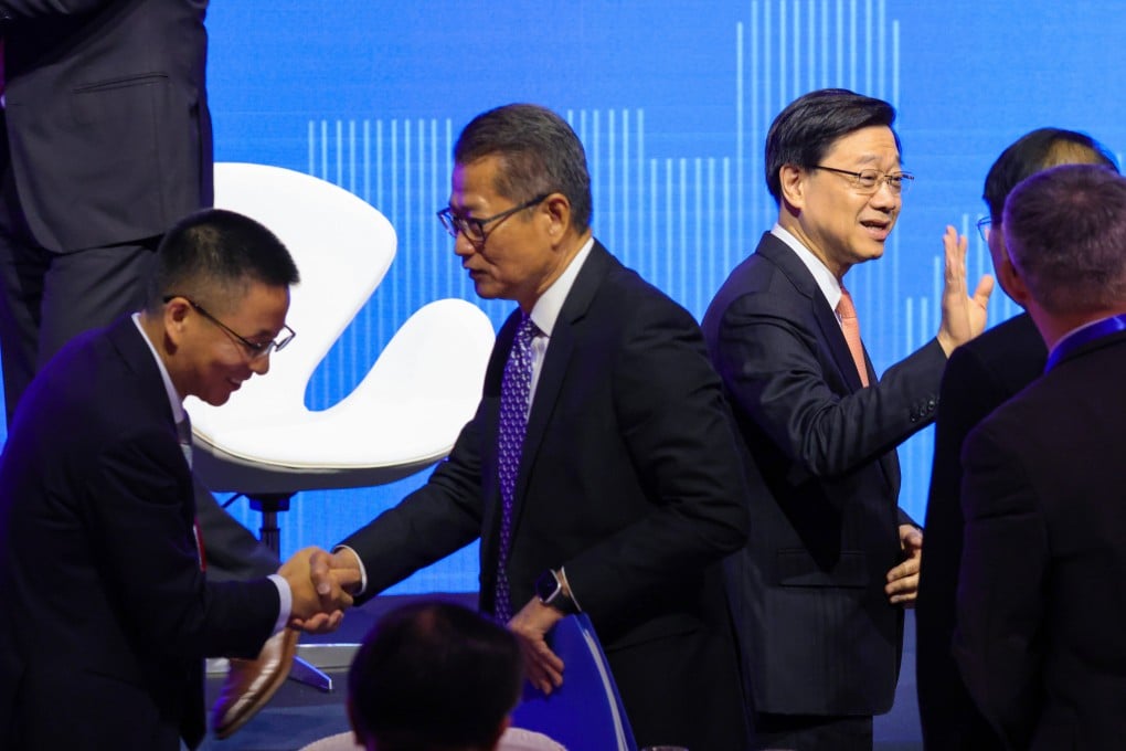 Chief Executive of Hong Kong SAR John Lee Ka-chiu (right) and Financial Secretary Paul Chan Mo-po during the second Global Financial Leaders’ Investment Summit at the Four Seasons Hotel in Central on 7 November 2023. Photo: May Tse.