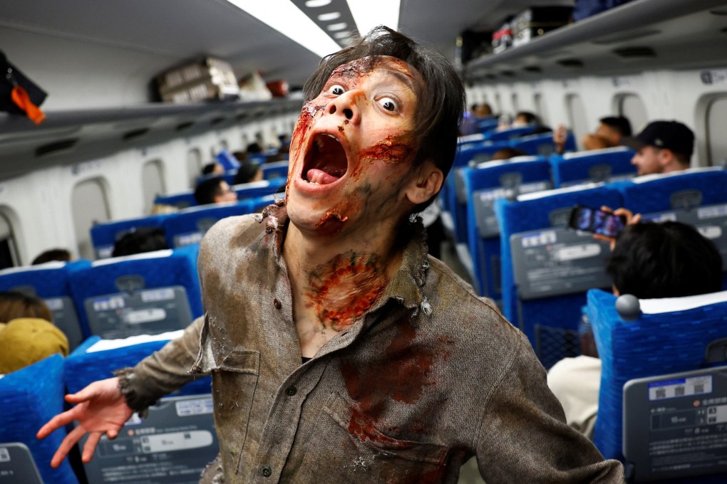 A performer dressed as a zombie for an encounter in a carriage of a Japanese high-speed train. The experience, for which guests paid up to US$335, took place on a Tokyo to Osaka service and was inspired by the hit Korean movie Train to Busan. Photo: Reuters