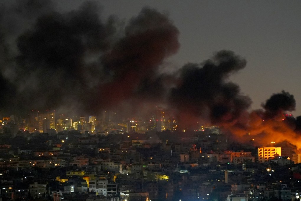 Smoke billows over Beirut’s southern suburbs after Israeli strikes. Photo: Reuters