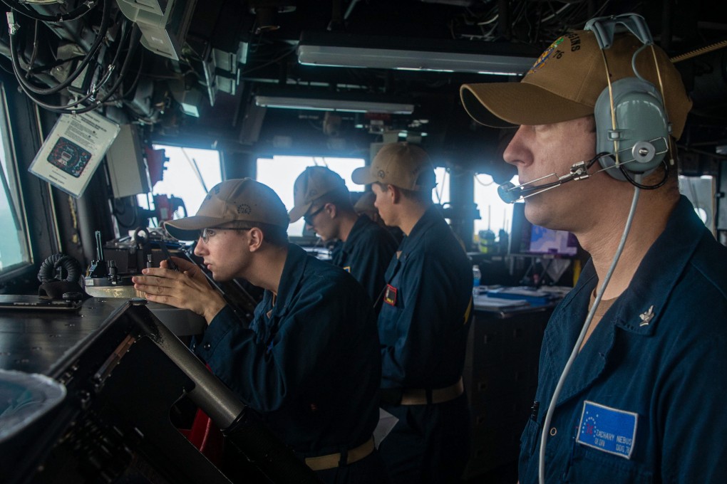 Sailors on the Arleigh Burke-class guided-missile destroyer USS Higgins take part in bilateral operations with the Royal Canadian Navy while transiting the Taiwan Strait on Sunday. Photo: US Navy