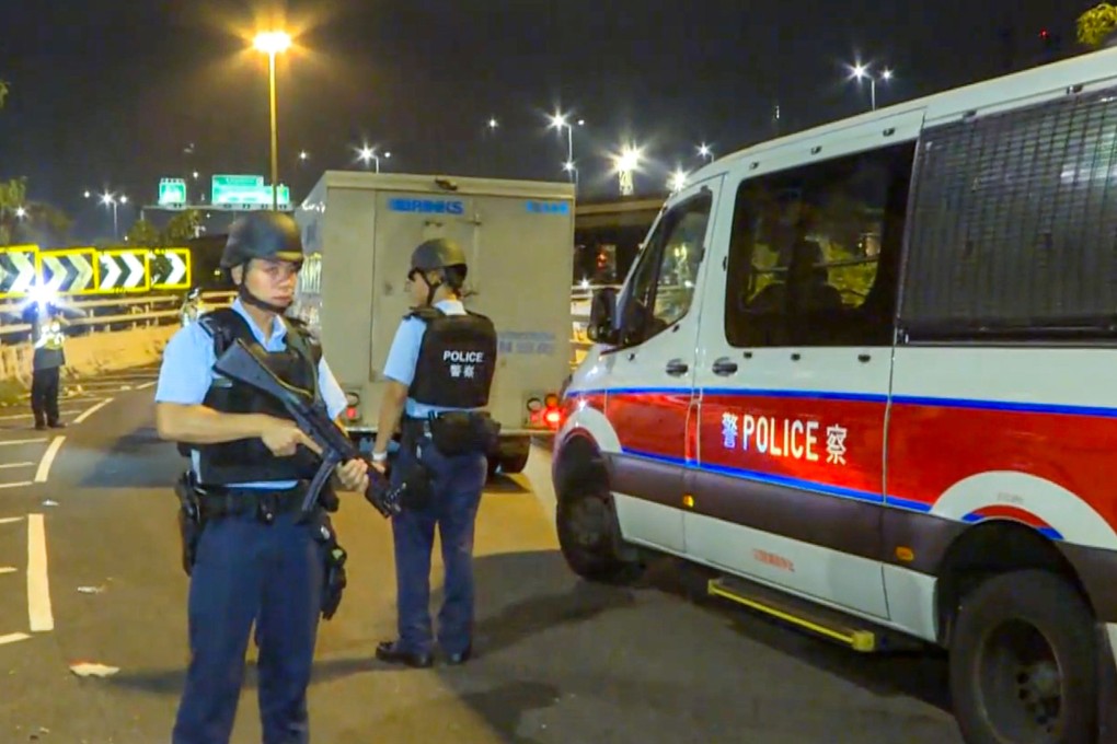 Hong Kong police despatched heavily-armed officers to the cash delivery van crash site. Photo: Cable TV News