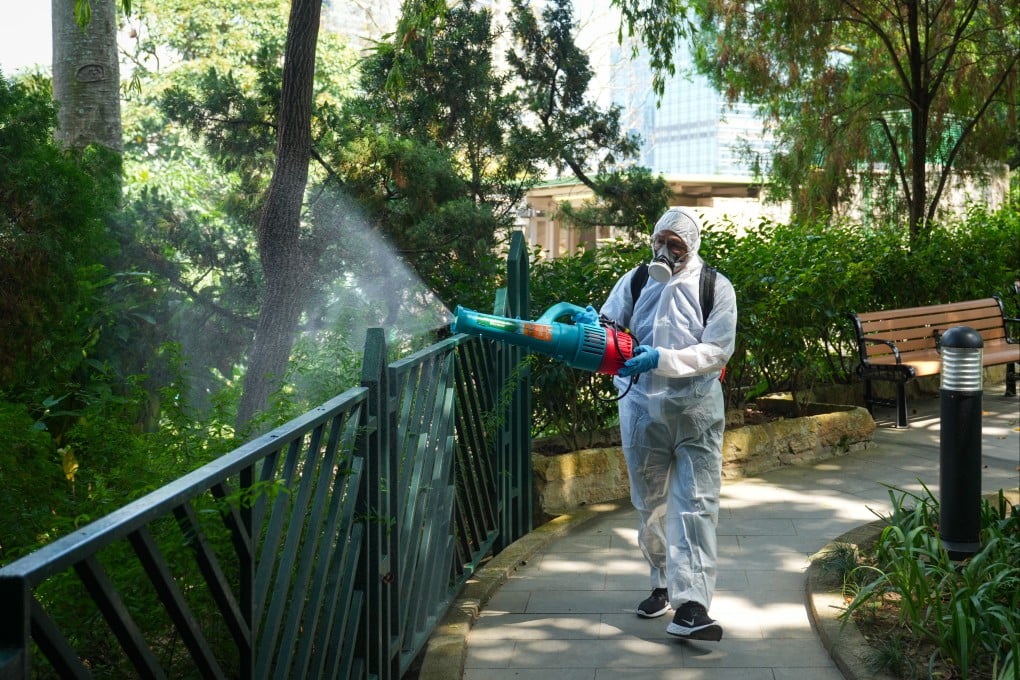 Staff carry out disinfection work at Hong Kong Zoological and Botanical Gardens in Central. Photo: Sam Tsang