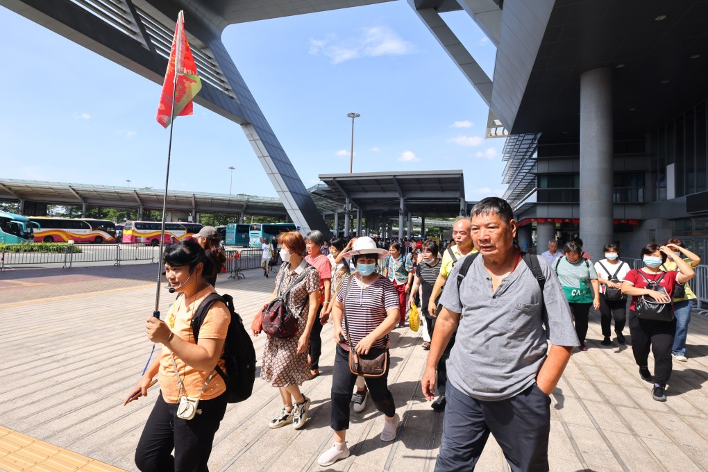 Tour groups from the mainland head for Hong Kong from the Shenzhen Bay Port on October 1. Photo: Dickson Lee