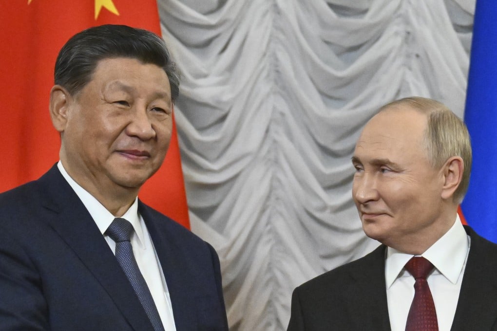 Russian President Vladimir Putin (right) welcomes Chinese President Xi Jinping during their meeting on the sidelines of the Brics summit in Kazan, Russia, on Tuesday. Photo: EPA-EFE