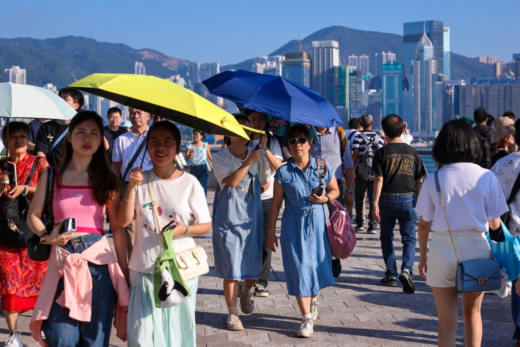 Tourists at the Tsim Sha Tsui promenade. Photo: Nora Tam