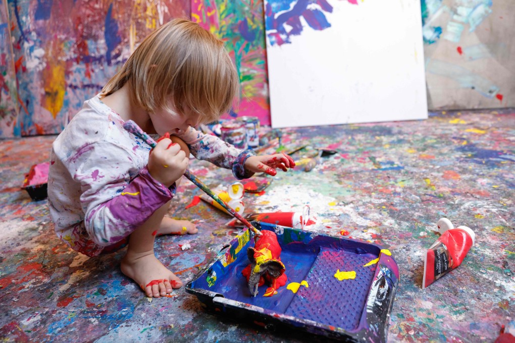 Dubbed the “mini-Picasso, Laurent Schwarz, three years old, has become an Instagram and art world star.  Photo: AFP