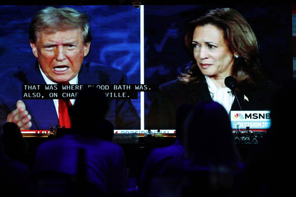 People watch the ABC News presidential debate between Democratic presidential nominee, US Vice President Kamala Harris, and Republican presidential nominee, former US president Donald Trump, at a watch party in West Hollywood, California, on September 10. Photo: Getty Images/TNS