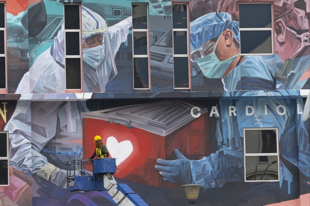 A giant mural tribute outside a hospital in Kuala Lumpur, Malaysia. Photo: AP
