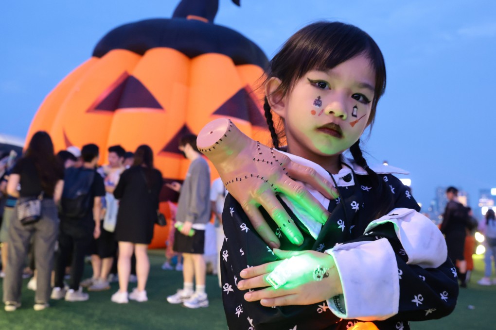 Studies confirm that seeing masked faces, hearing screams, and watching parades of people dressed as ghosts or corpses during Halloween can genuinely terrify children and can lead to lasting phobias. Photo: May Tse