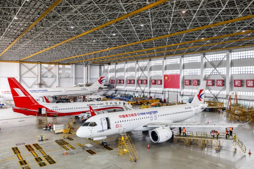 China’s C919 and ARJ21 passanger jets at a hangar in Shanghai. Photo: Civil Aviation Administration of China