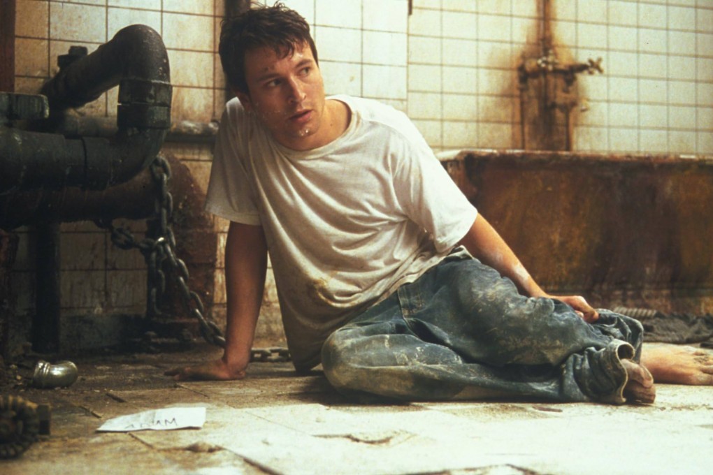 Leigh Whannell as sleazy photographer Adam in a still from Saw (2004), the horror film that inspired a sub-genre of torture films. Photo: Lions Gate Films