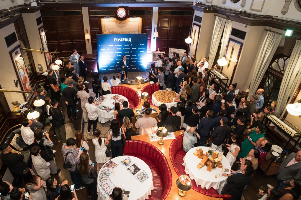 Guests gathered around the former courtroom of The Magistracy in Hong Kong, celebrating the launch of PostMag. Photo: SCMP