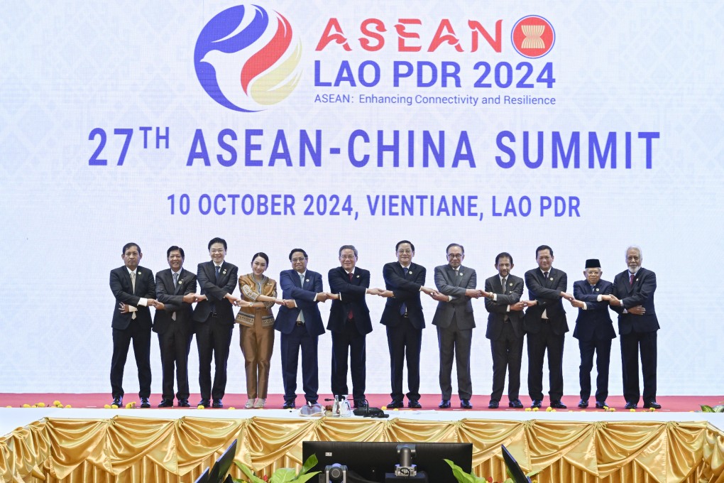 Chinese Premier Li Qiang poses for a group photo at the China-Asean Summit in Vientiane on October 10. Photo: Xinhua