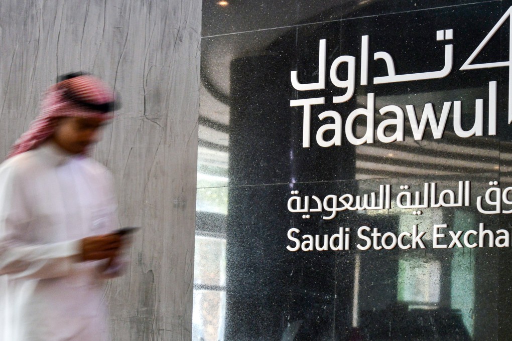This picture taken December 12, 2019 shows the sign and logo of Saudi Arabia’s Stock Exchange Market (Tadawul) in the capital Riyadh.  Photo: AFP