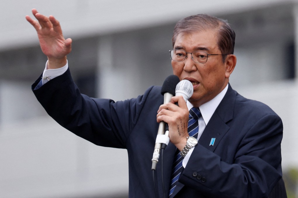 Japan’s Prime Minister Shigeru Ishiba, leader of the Liberal Democratic Party, speaks at a campaign for the general election in Tokyo on Saturday. Photo: Reuters