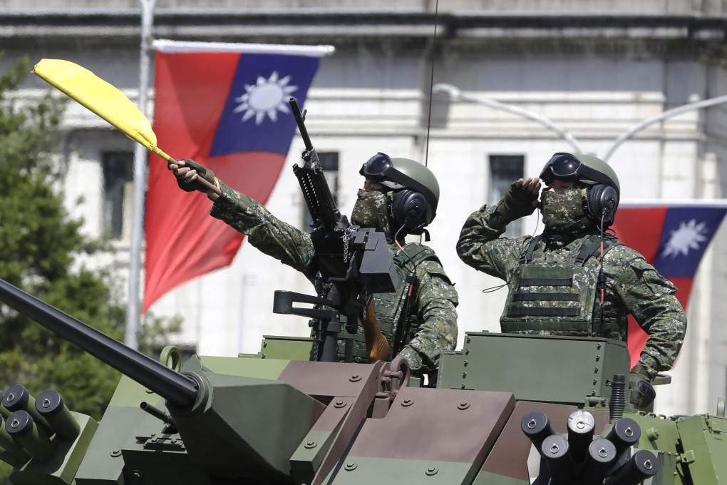 FILE - Taiwanese soldiers salute during an event in Taipei, Taiwan, in October 2021. Photo: AP