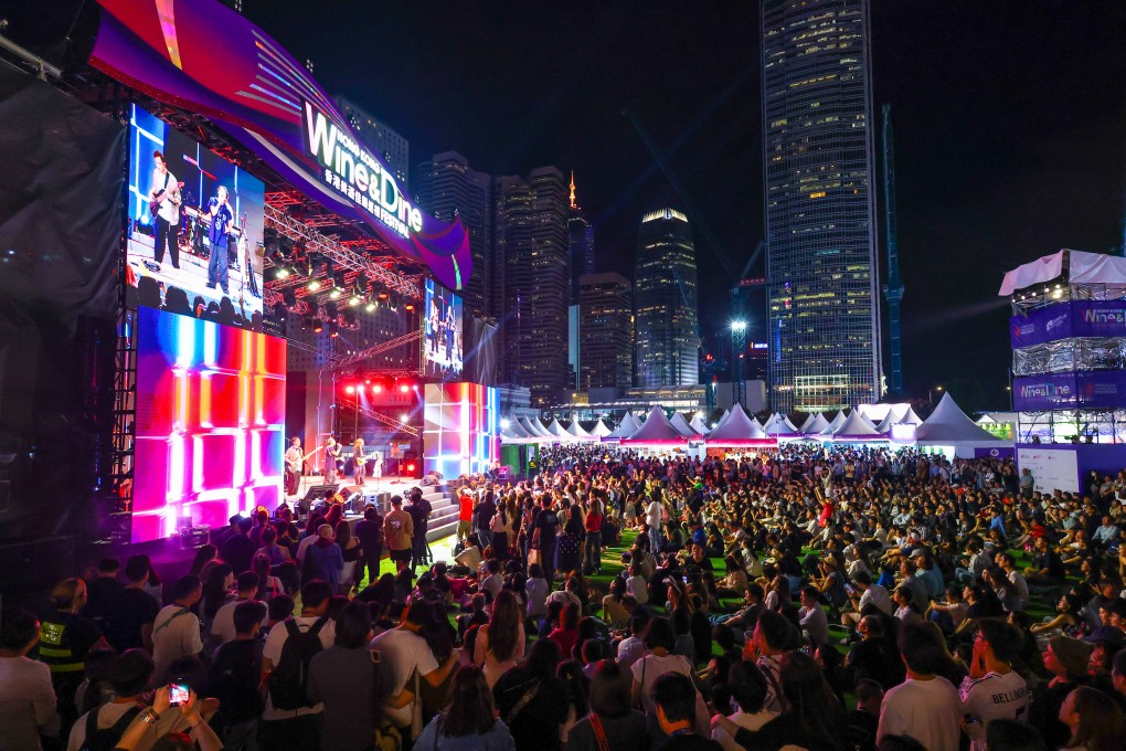 Revellers enjoy evening entertainment at the Central harbourfront. Photo: Nora Tam