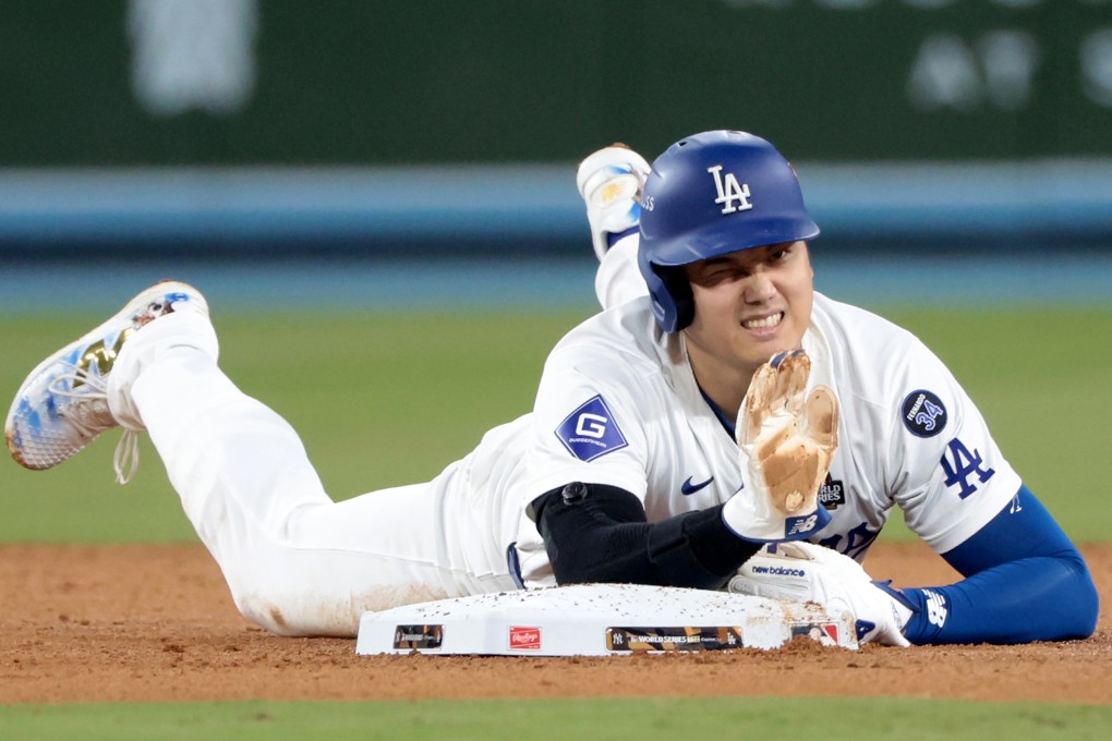 The Los Angeles Dodgers’ Shohei Ohtani partially dislocated his left should in an attempt to steal second in Game 2. Photo: AP