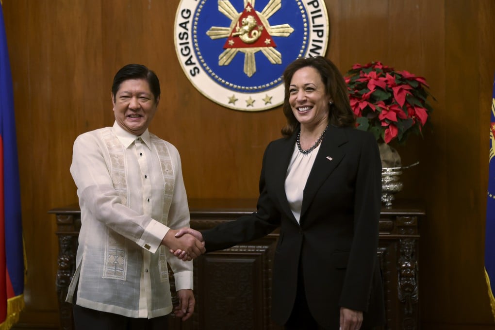 Philippine President Ferdinand Marcos Jnr shakes hands with US Vice-President Kamala Harris in Manila in 2022. Photo: Pool via AP