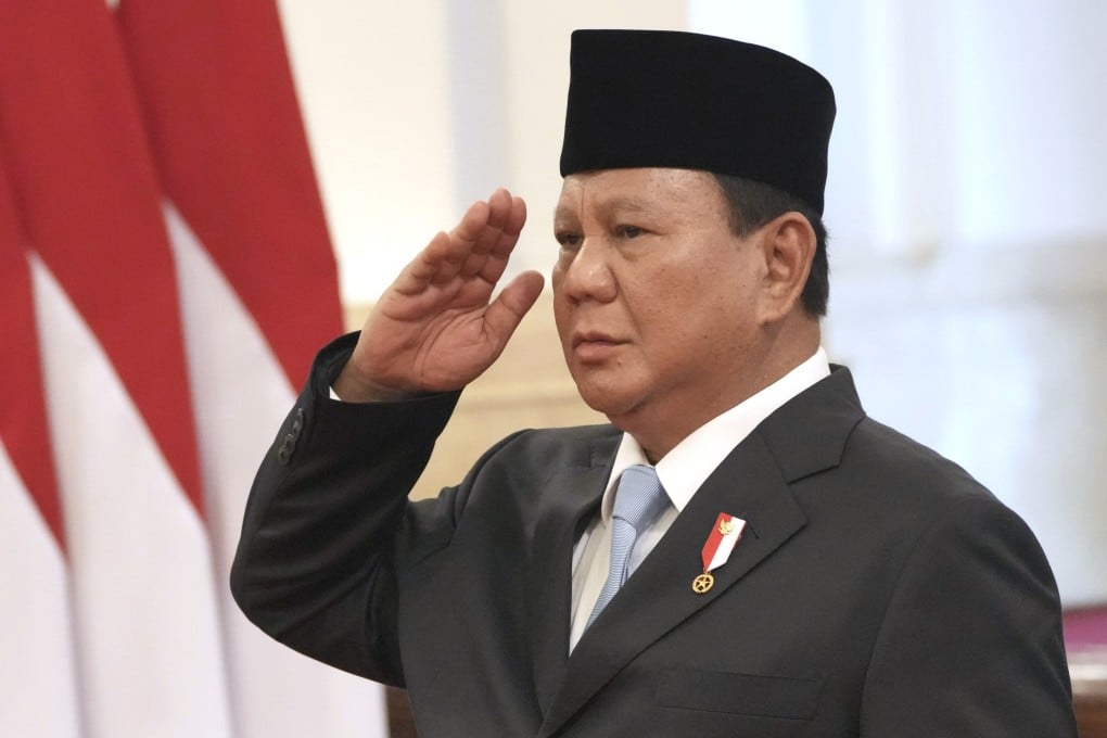 Indonesian President Prabowo Subianto salutes at a swearing-in ceremony in Jakarta on October 22. Photo: AP