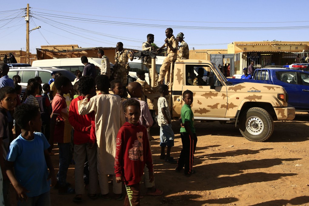 Armed police officers patrol a public area controlled by the Sudanese Armed Forces in Omdurman, Khartoum. Children are not spared the abuse, while women and girls are being abducted for sexual slavery, the UN Independent International Fact-Finding Mission for the Sudan said. Photo: Xinhua