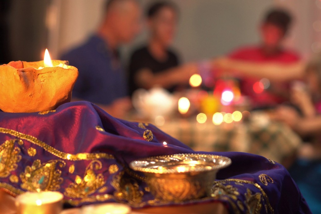 A family celebrating the Diwali festival. Photo: Shutterstock