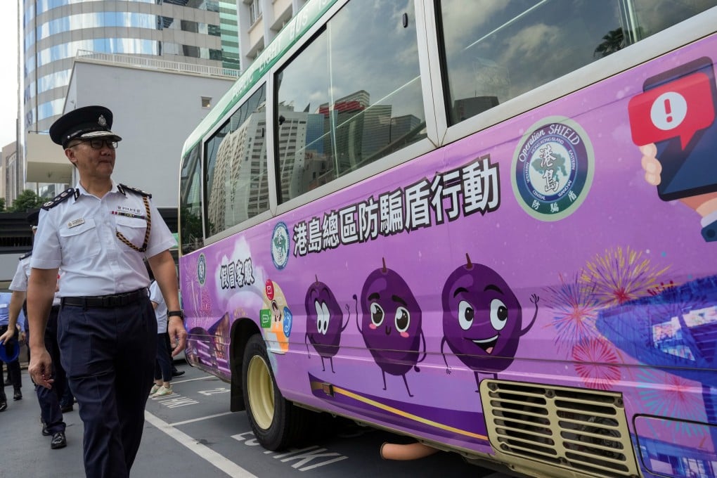 Commissioner of Police Raymond Siu attends the launch of five minibuses carrying adverts that promote scam prevention, on September 19. Photo: May Tse