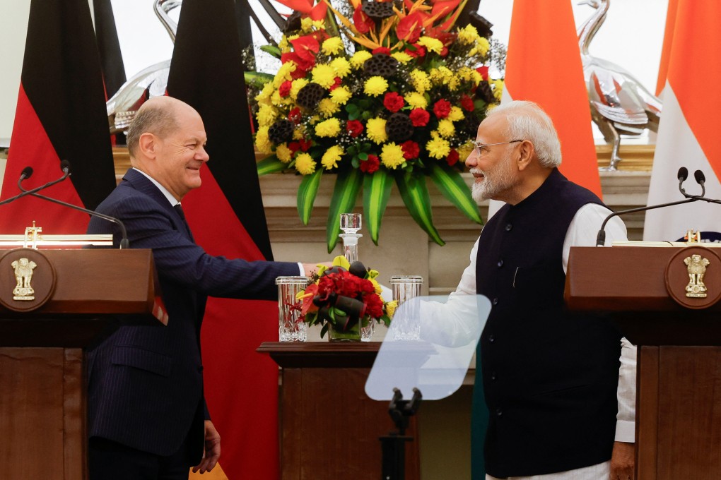 German Chancellor Olaf Scholz (left) and Indian Prime Minister Narendra Modi shake hands after their meeting at Hyderabad House in New Delhi, India, on October 25. Photo: Reuters
