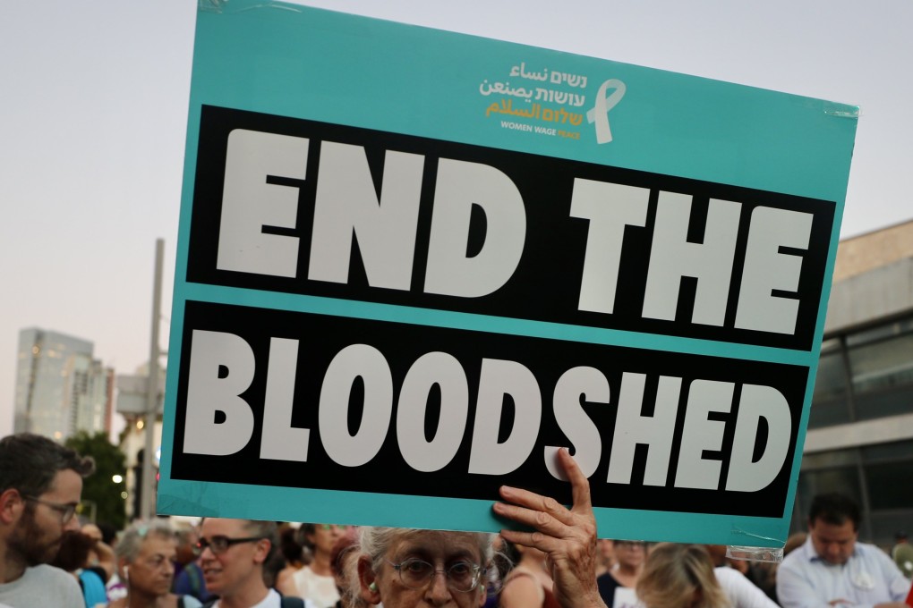 People take part in a demonstration in demand of an immediate ceasefire in Gaza and a deal for the release of the remaining hostages held by Hamas in Tel Aviv, Israel, on July 25. Photo: Xinhua