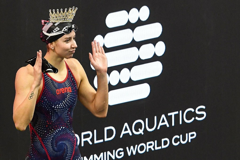 US’ Kate Douglass celebrates after victory in the women’s 100m medley final. Photo: AFP