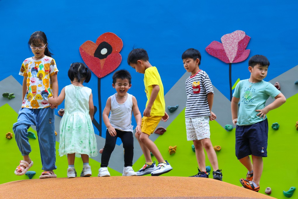 Children at a playground in Mong Kok. Lawmakers passed a bill in July requiring workers in 25 professions to report suspected child abuse to authorities. Photo: Jelly Tse