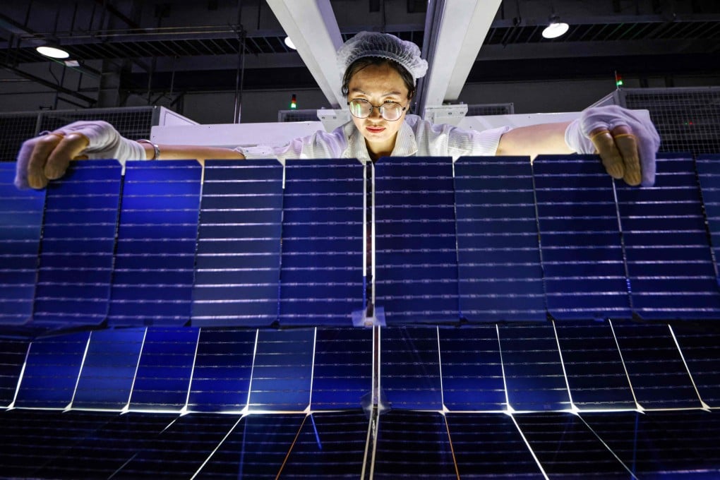 An employee works on solar photovoltaic modules for export at a factory in Sihong, in eastern China’s Jiangsu province, on September 3, 2024. Photo: AFP