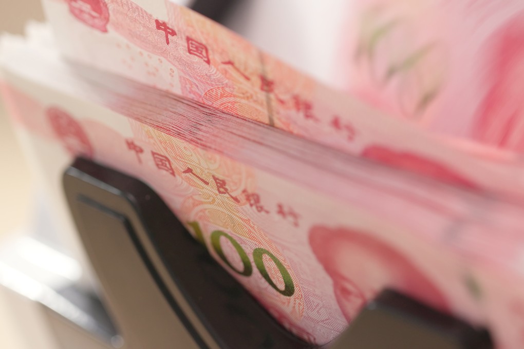 Money counting machine for Chinese yuan. Photo: Shutterstock