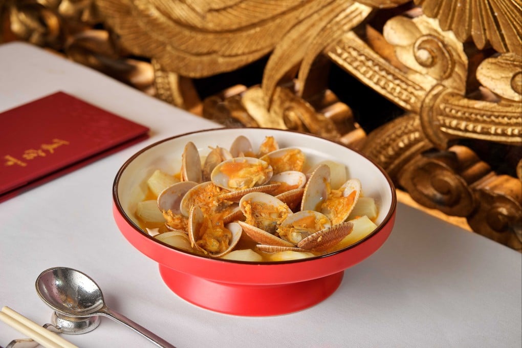 Enjoy poached fresh clam and baby cabbage in hairy crab roe sauce at Summer Palace. It is one of nine places in Hong Kong we recommend this hairy crab season. Photo: Summer Palace