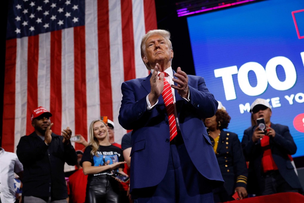 Former US president and Republican presidential nominee Donald Trump applauds during a campaign rally in Atlanta, Georgia on October 15, 2024. Photo: AFP