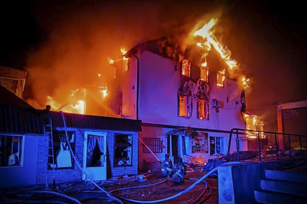 Ukrainian rescuers working at a burning residential building in Mykolaiv, Ukraine, amid the ongoing Russian invasion. Photo: EPA-EFE