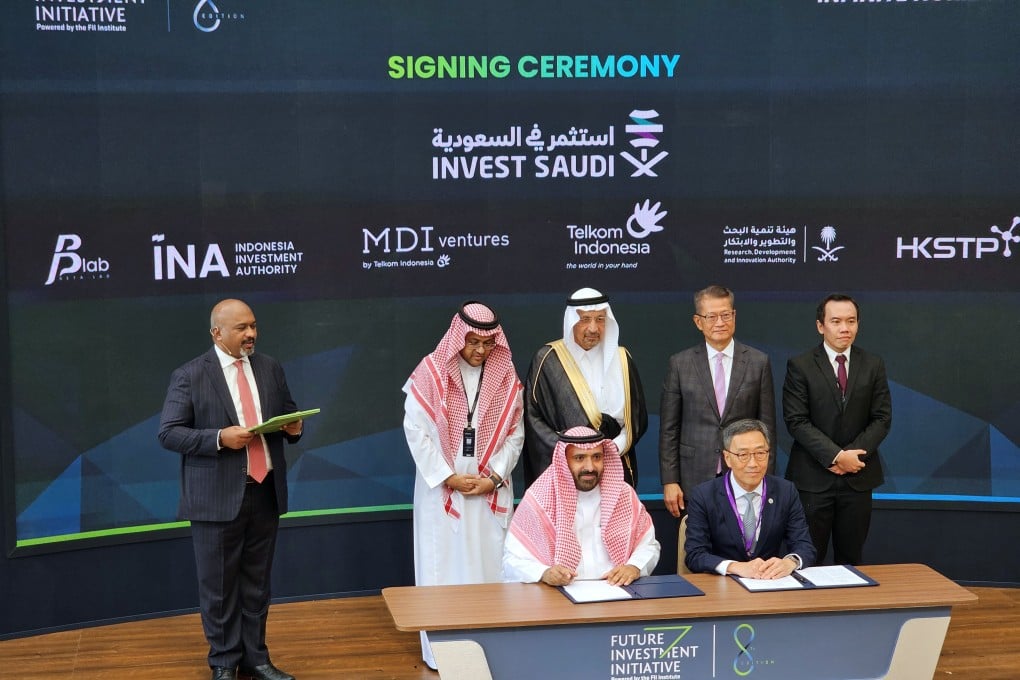 HKSTP CEO Albert Wong Hak-keung (seated, right) signs the agreement with Beta Lab founder Abdulrahman Alolayan in Riyadh on October 29. Photo: Enoch Yiu