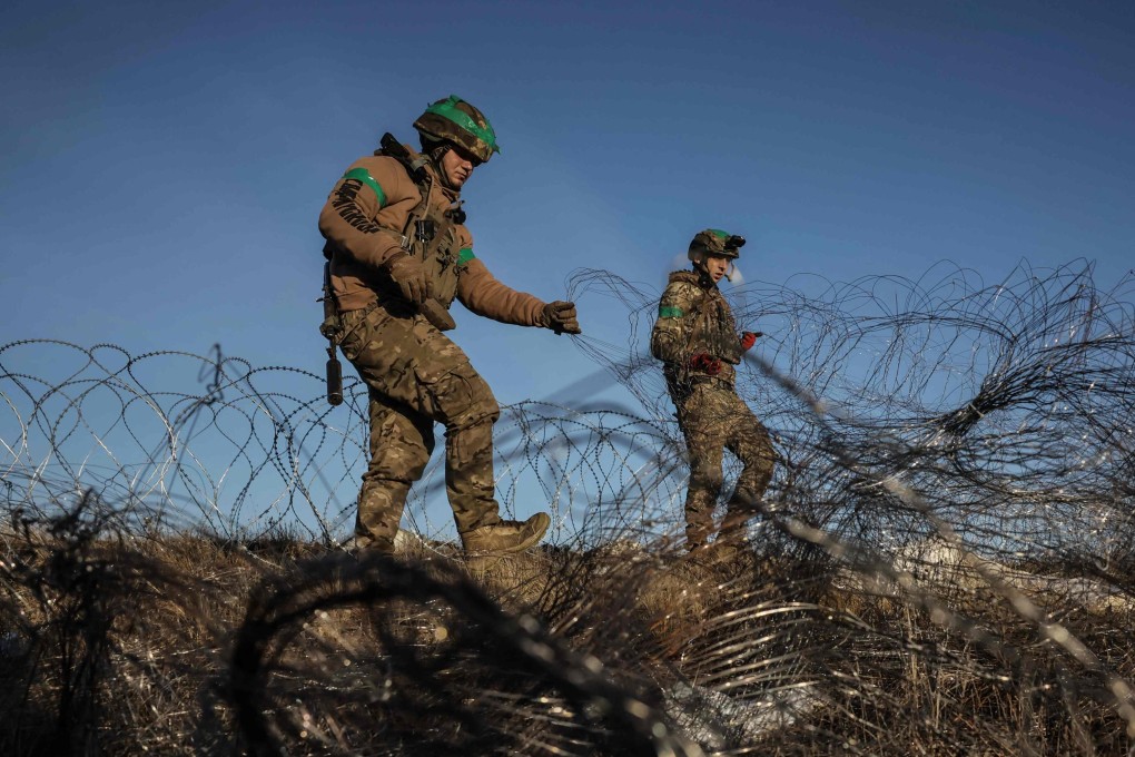 Ukrainian troops installing obstacles along the frontline in the Donetsk region, amid the Russian invasion in Ukraine. Photo: AFP