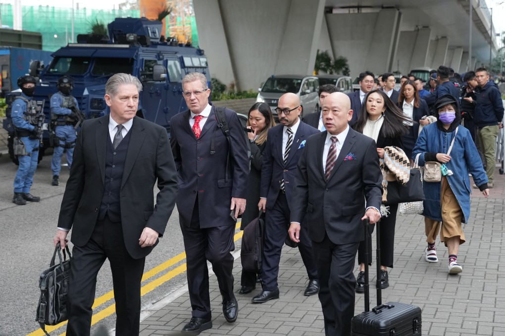 Lawyers of tycoon Jimmy Lai Chee-ying leave the West Kowloon Court on December 18, 2023, following a hearing on Lai’s sedition and conspiracy charges in connection with the 2019 anti-government protests. File photo: Sam Tsang