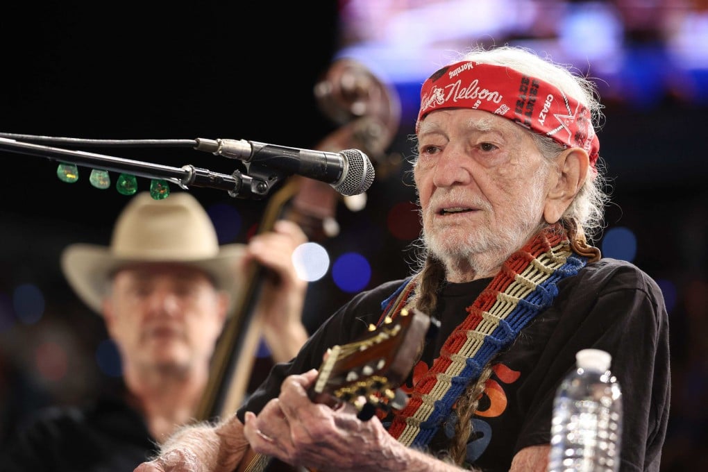 Musician Willie Nelson performs during a campaign rally with Democratic presidential candidate, US Vice-President Kamala Harris, on October 25, 2024 in Houston, Texas. Has has just released his 153rd album, Last Leaf on the Tree. Photo: Getty Images via AFP