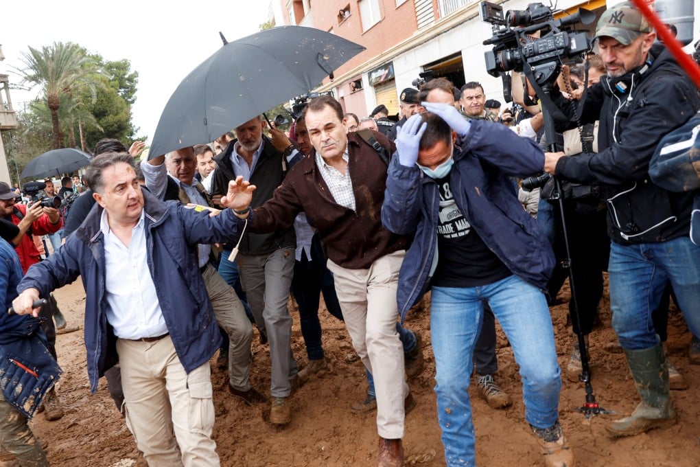 People throw mud at Spain’s King Felipe as he visits Paiporta, near Valencia, Spain. Photo: Reuters
