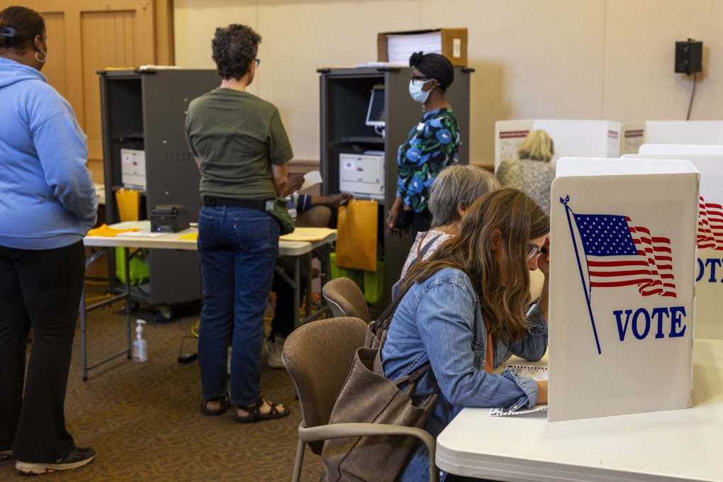Early voters fill out their ballots at the Susan B. Anthony Museum & House in Rochester. Photo: AP