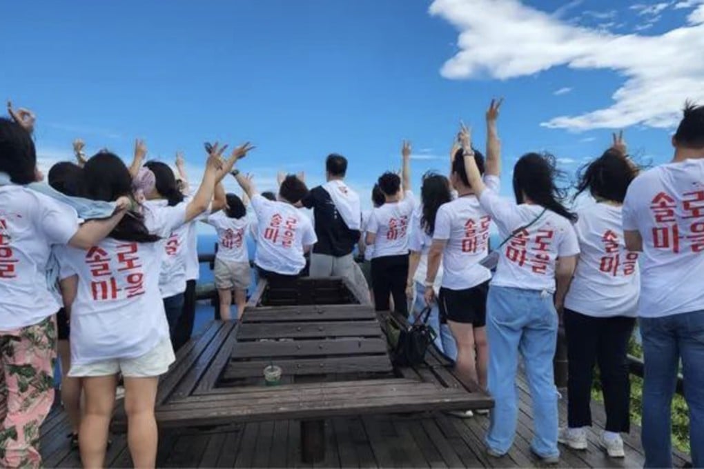 Participants pose during a matchmaking programme arranged by the North Gyeongsang provincial government. Programmes like these are being criticised for being ineffective. Photo: courtesy of North Gyeongsang Province