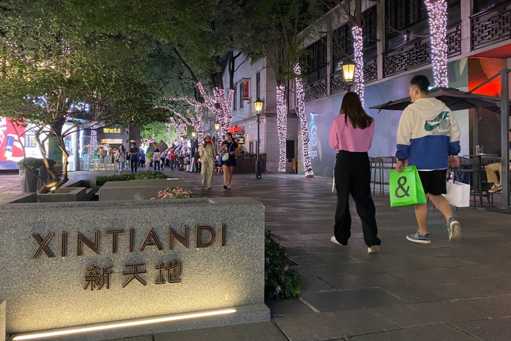 People walk past a commercial compound in Xintiandi, Shanghai in September 2022. Photo: Yaling Jiang