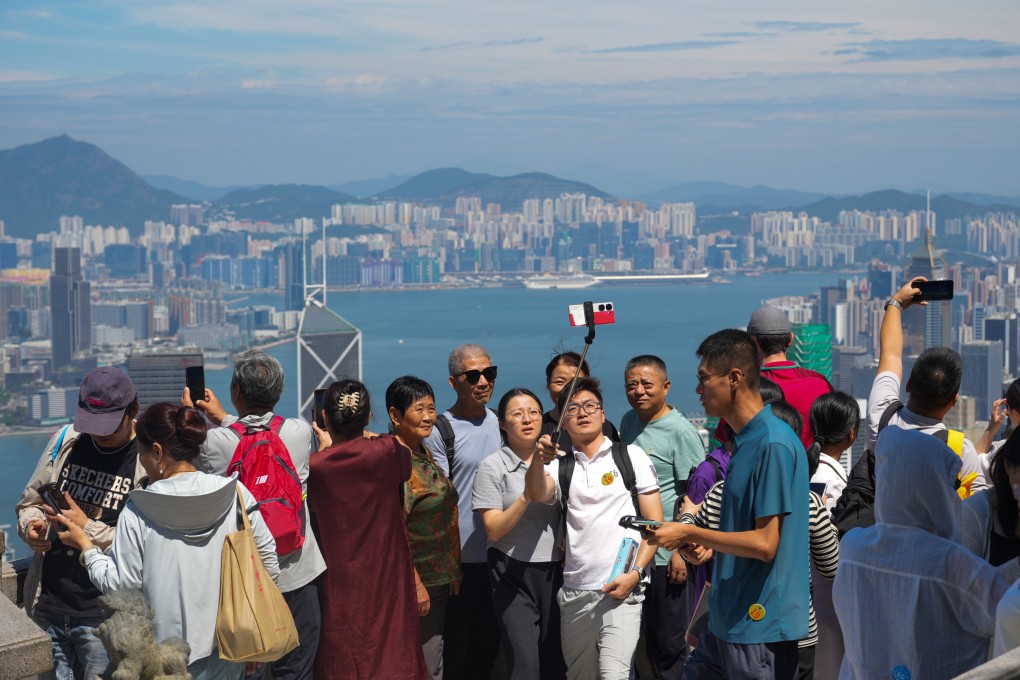 Tourists explore the scenic Lions Pavilion at The Peak during the National Day ‘golden week’ holiday on 2 October 2024. Photo: May Tse