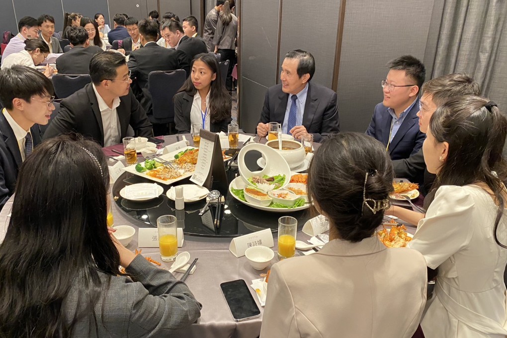 Former Taiwanese leader Ma Ying-jeou (blue tie) hosts a banquet for a visiting mainland Chinese student delegation, in Taipei in July 2023. Photo: Handout