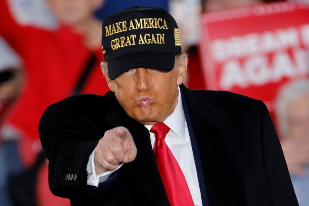 Republican presidential nominee and former US president Donald Trump points as he speaks during a rally in North Carolina on Sunday. Photo: Reuters