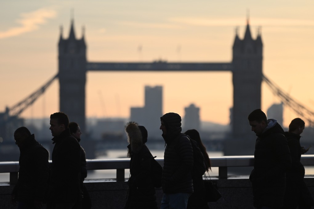 Commuters pass Tower Bridge. Wealthy Malaysians are so enamoured with the British capital that they’ve dubbed the city “Kuala London”. Photo: EPA-EFE