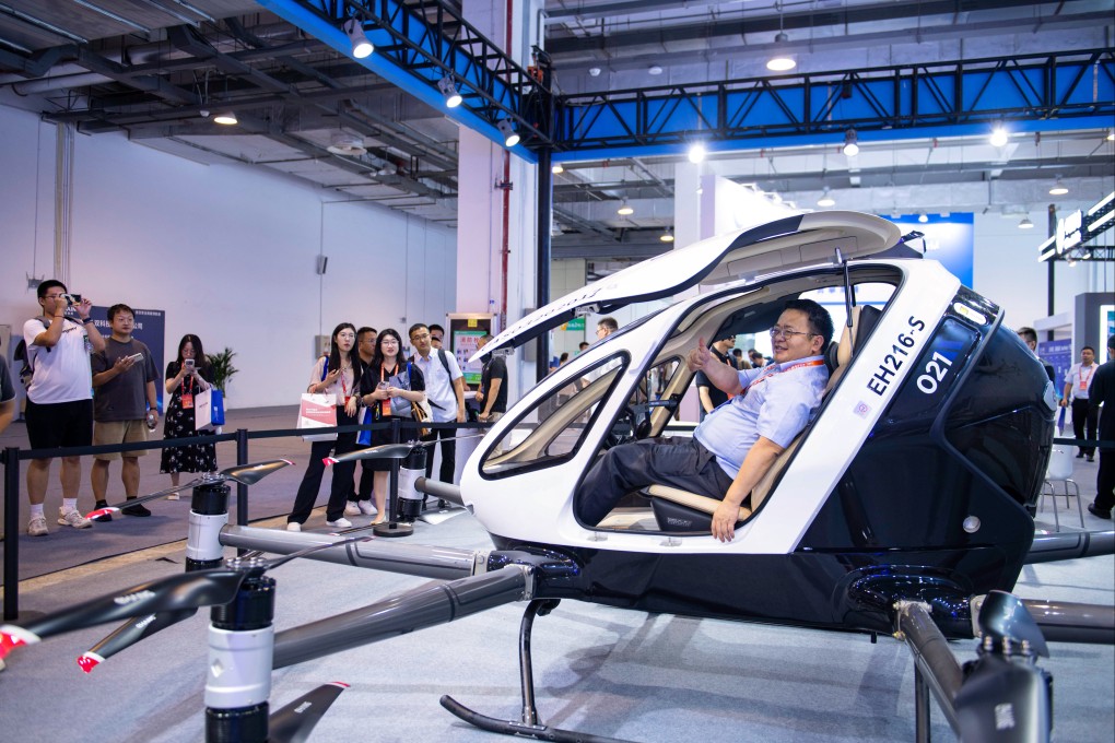 A visitor tests out an electric aircraft at an exhibition of the 2024 Low Altitude Economic Development Conference in Wuhu, east China’s Anhui province. Photo: Xinhua